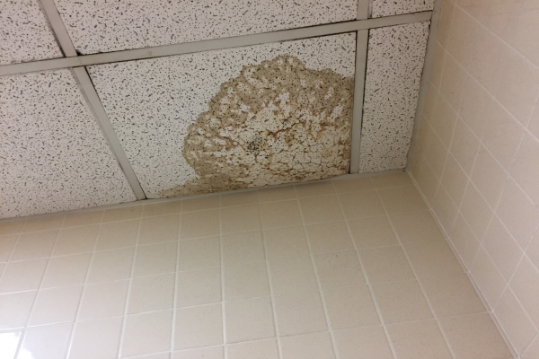 a yellowish ceiling due to a heavy property leak